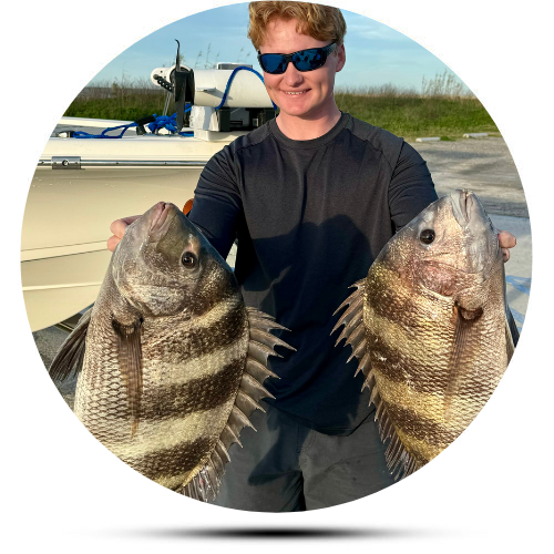 Captain Tim Triplett with 2 fish 500x500